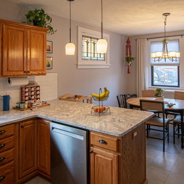 Bathroom/Laundry Room Using Warmer Tones, Accented by New Laundry Facility