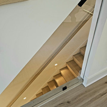 Project #111 | Open-Riser Staircase with Glass Panel Detail