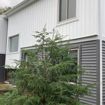 Modern Exterior Renovation with Vinyl Siding & Trim in Commerce Michigan