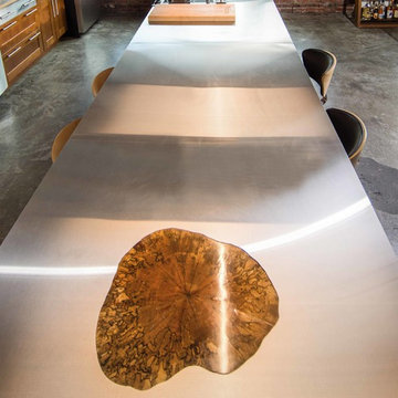 Downtown Loft Transformation Unites Industrial and Organic Elements