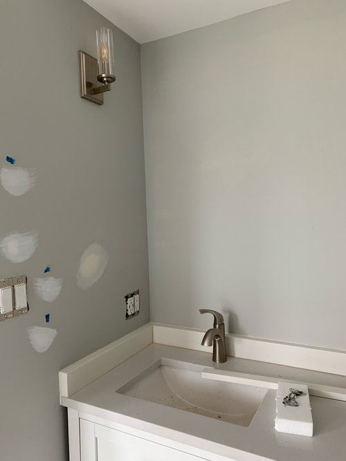 bathroom sconce placement looks off