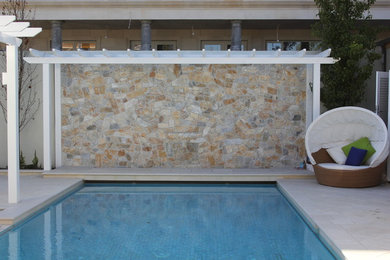 Design ideas for a traditional pool in Melbourne.