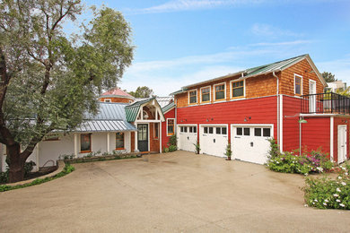 Inspiration for a farmhouse wood exterior home remodel in Los Angeles