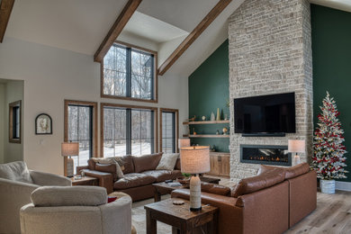 Living room - large transitional open concept vinyl floor, beige floor and vaulted ceiling living room idea in Other with white walls, a ribbon fireplace, a stone fireplace and a wall-mounted tv