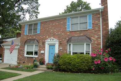 Large craftsman red two-story brick exterior home idea in DC Metro