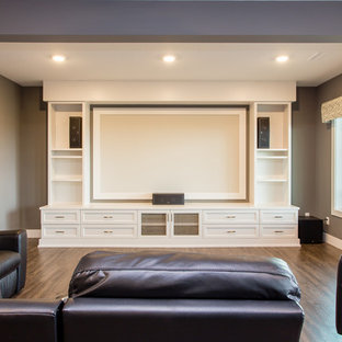 Design ideas for a large modern open plan home cinema in Calgary with grey walls, vinyl flooring and a projector screen.