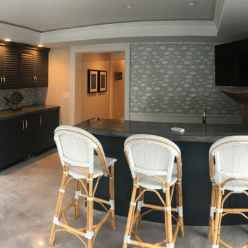 A fully equipped laundry room with a built ins