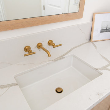 Undermounted Sink and Brushed Brass faucets