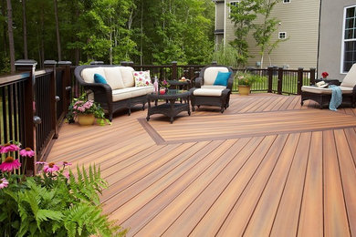Example of a mid-sized transitional backyard deck container garden design in Other with no cover