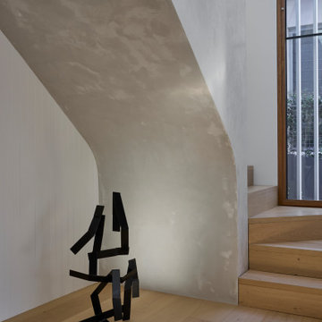 Minimalist Stairwell with Sculptural Accent
