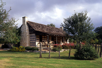 Rustic exterior home idea in Austin
