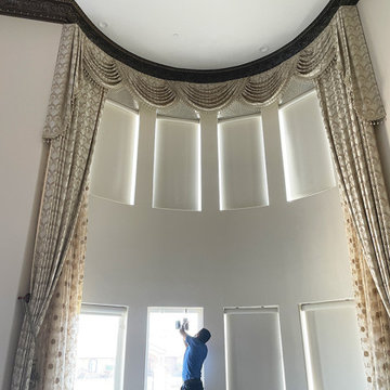 Fresno Residential Project , round windows 20 feet height ceiling motorized