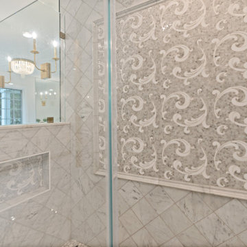 Custom Marble Shower with Intricate Tile Inlay