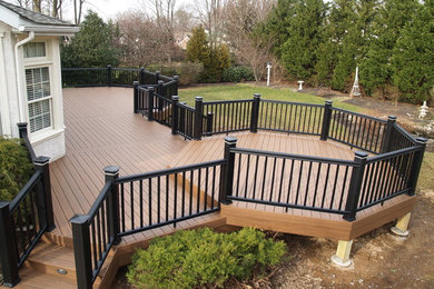 Inspiration for a large craftsman backyard deck remodel in Philadelphia with no cover
