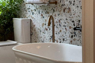 Large contemporary bathroom in Melbourne with a freestanding tub, a curbless shower, a one-piece toilet, ceramic tile, a vessel sink, wood benchtops, an open shower, a single vanity and a freestanding vanity.