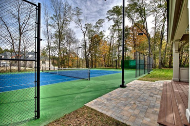 Inspiration for a large traditional full sun backyard brick outdoor basketball/tennis/multi-game court in Indianapolis for summer.