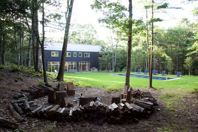 Design ideas for a contemporary landscaping in New York with a fire pit.