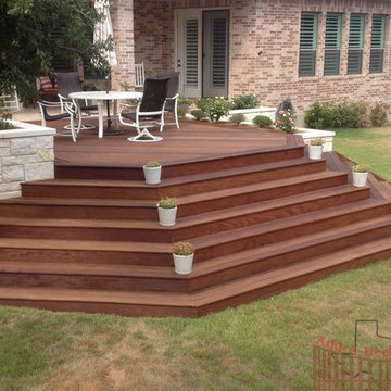 Ipe Hardwood Decking with Metal Framing, Limestone Flower Beds around Deck