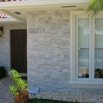 Exteriors with Snowhite Format Natural Stone Wall Panels