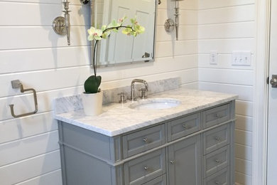 Inspiration for a coastal green tile bathroom remodel in Boston with furniture-like cabinets and gray cabinets