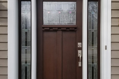Example of an arts and crafts exterior home design in Other