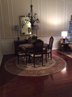 What size area rug under oval dining table 4' x 5.5'?