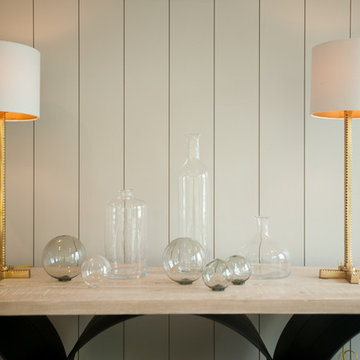 Adding a nice touch with some of our lamps and glass vase collection.