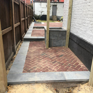 Red Brick Patio with Thermal Blue Border, Flower Boxes, & Steps in Washington DC