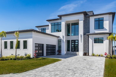 Example of a minimalist exterior home design in Miami