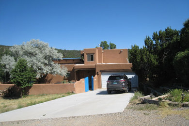 Example of a southwest exterior home design in Albuquerque