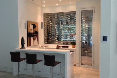Mid-sized minimalist light wood floor wine cellar photo in Miami