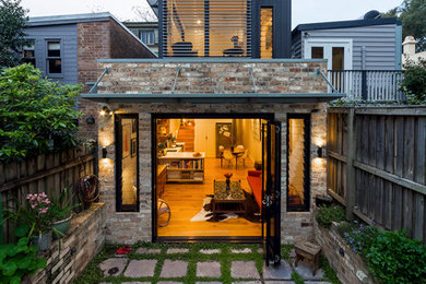 Photo of a traditional home design in Sydney.