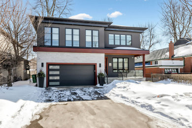 Example of a minimalist exterior home design in Toronto