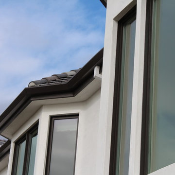 6 inch Angle Face/Flat Face Gutters with smooth Downspouts in Pacific Palisades