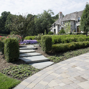 Full Landscape with Patio, Outdoor Kitchen, Stone Driveway and Planting