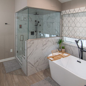 Traditional Master Bathroom With Warm Tones, Stand Alone Tub & Walk In Shower
