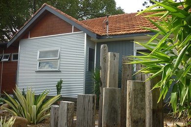 This is an example of a contemporary garden in Brisbane.