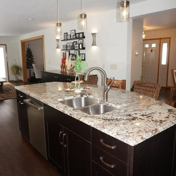 Kitchen, hutch, buffet open to adjacent spaces