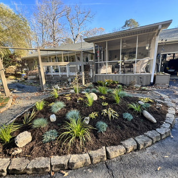 This thoughtfully arranged garden bed features a harmonious blend of ornamental
