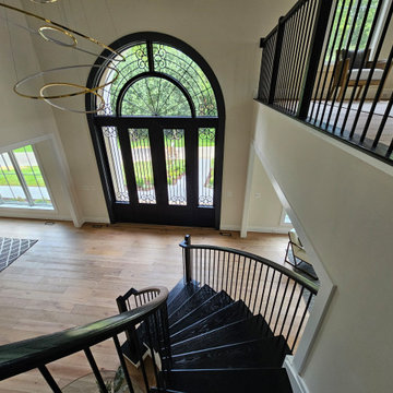 Project #130 | Curved Staircase with Wraparound Balcony