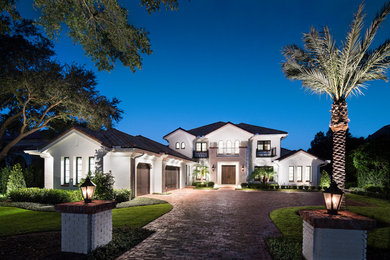 Tuscan exterior home photo in Orlando