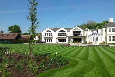 Photo of a modern home design in Surrey.