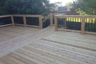 Photo of a large backyard deck in Other.