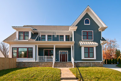 Mid-sized traditional green two-story concrete fiberboard gable roof idea in DC Metro