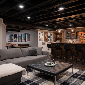 Finished Basement with Irish Themed Bar, Gym, Bathroom and Gamer Area in Canton,