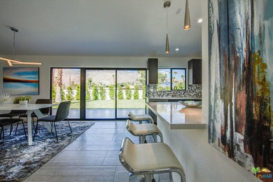 Example of a minimalist dining room design in Other