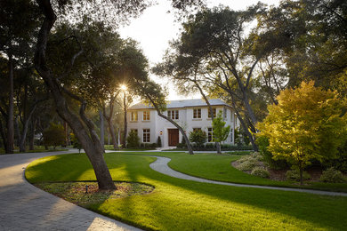 Inspiration for a huge transitional shade front yard concrete paver driveway in San Francisco.