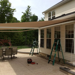 Retractable Awnings - Window Coverings - - Awnings