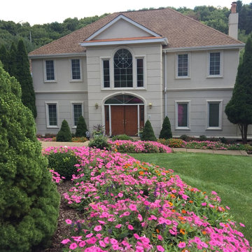 Pink Wave Petunias and Orange Profusion Zinnias