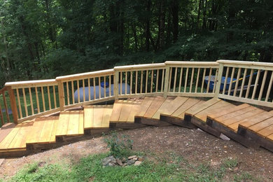 Design ideas for a large rustic shade hillside mulch garden path in Charlotte.